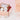 Gift box containing cute wedding gift ideas for friends, including mugs and a card for newlyweds.