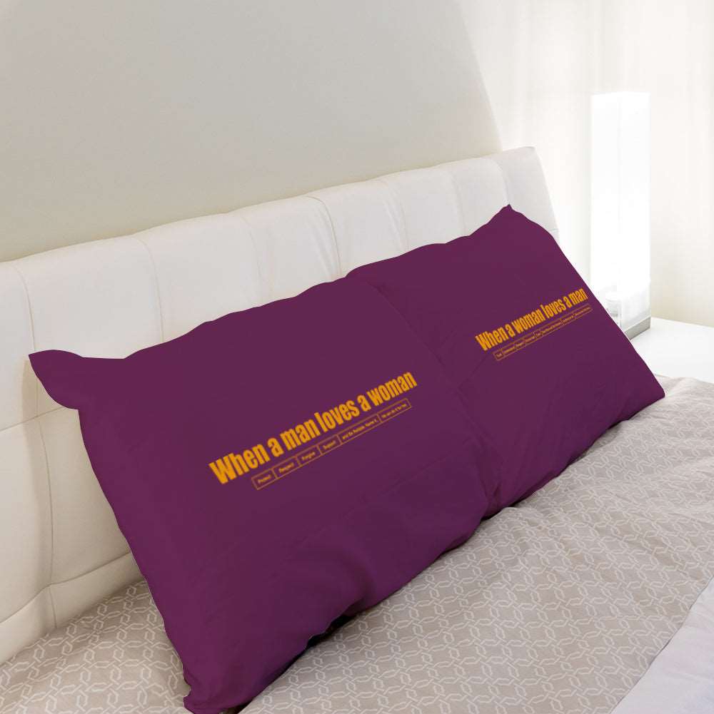 a purple pillow sitting on top of a bed 