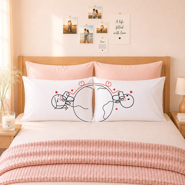 White couple pillowcases with red heart line-art couple design on front
