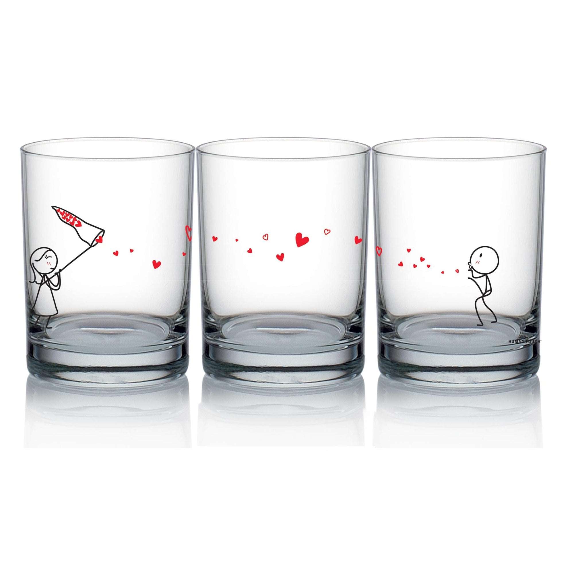 a set of three glasses of wine sitting next to each other 