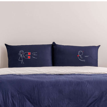 His and hers pillowcases with a magnet design, perfect as a magnet themed anniversary gift