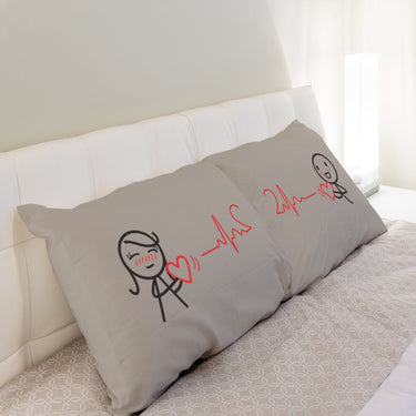 His and hers pillowcases with playful heart designs, ideal anniversary keepsake gifts
