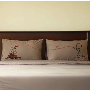 His and hers pillowcases with cute couple illustrations, perfect for couple gift ideas.