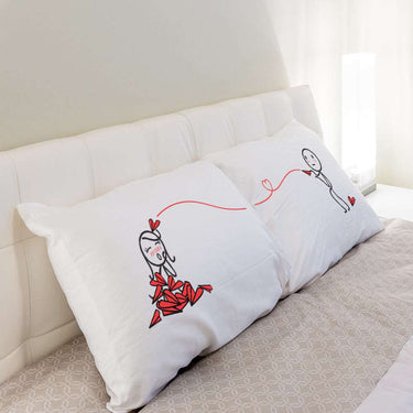 His and hers pillowcases featuring playful designs, perfect for couple gift ideas