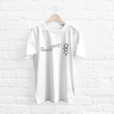 White couple matching t-shirts featuring a playful design with a girl and a winding path
