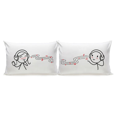 Cute couple pillow set featuring playful designs of a couple with headphones and hearts
