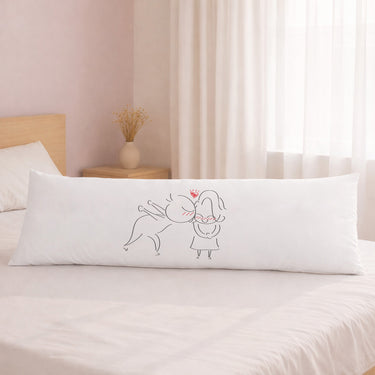 Long bed pillow with a cute kissing pillow design featuring playful characters
