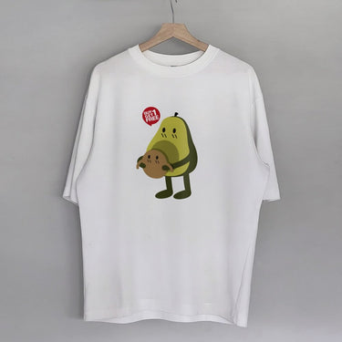 Funny avocado matching shirt featuring a cute avocado character holding a cookie for trendy street fashion