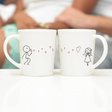 Heartfelt anniversary gifts coffee mugs boy meets girl with cute couple illustrations and love hearts