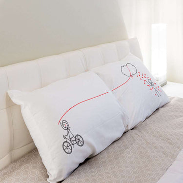 His and hers pillowcases with playful illustrations, perfect for heartfelt home decor