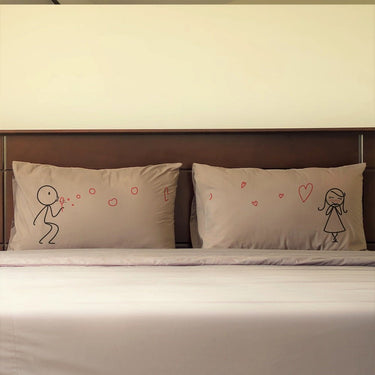 Whispers of Love his and hers pillowcases featuring cute couple illustrations, perfect anniversary keepsakes