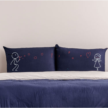 His and hers pillowcases featuring sweet hand-drawn characters, perfect as anniversary keepsakes