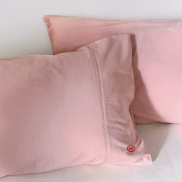 His and hers Japanese cotton pillowcases in soft pink, perfect for anniversary pink gift ideas