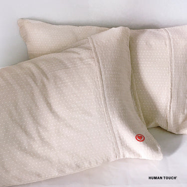 Human Touch his and hers pillowcases in soft fabric, ideal as a love-inspired gift set
