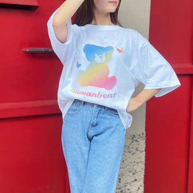 Model wearing a Human Touch rainbow bear cool street t-shirt with colorful graphic design