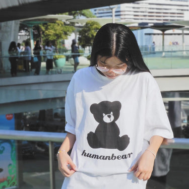 Human Touch Street Fashion Tee Shirt featuring a bear graphic design in white for casual wear