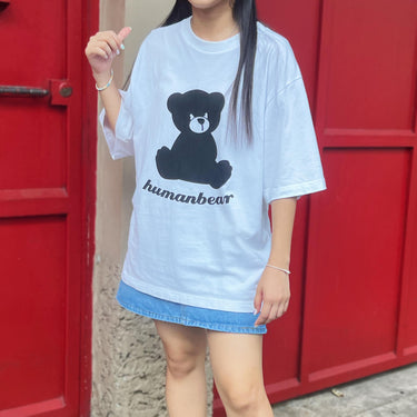 White Street Fashion Tee Shirt featuring a black bear graphic design by Human Touch