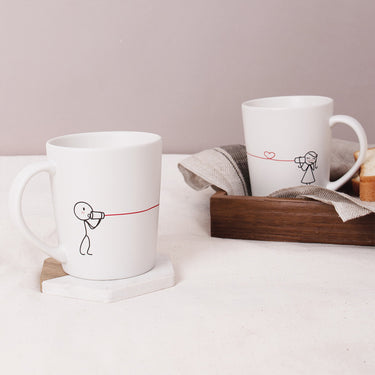 Cute couples coffee mugs featuring playful designs, perfect anniversary keepsakes for him and her.