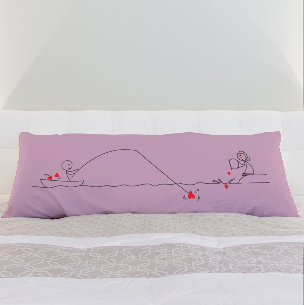 a pink pillow with a pink flower on it 