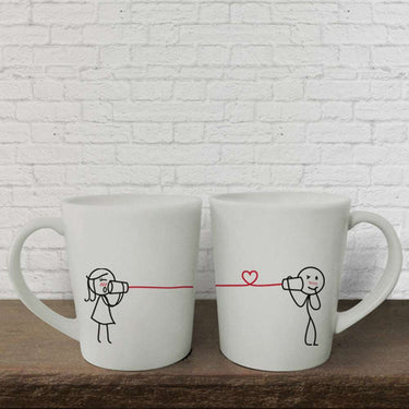 Charming couple mugs for long distance relationships featuring playful stick figures with a love connection