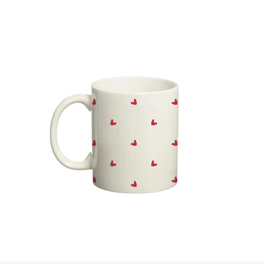 Ceramic coffee mug featuring hearts polka dot design, perfect as a cute and romantic gift for loved ones