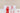 White long pillow with two red line-art characters on the front
