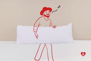 White long pillow with a red line-art character in standing pose
