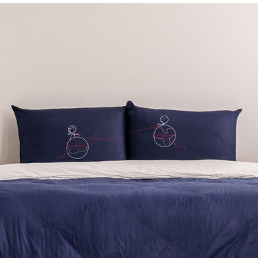 His and hers pillowcases with a design symbolizing connection, a perfect long distance relationship gift