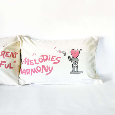 His and hers organic cotton romantic couple pillow set with playful designs and heartfelt messages