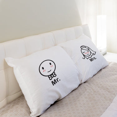 His and hers pillowcases featuring Mr and Mrs designs, a perfect personalized anniversary gift