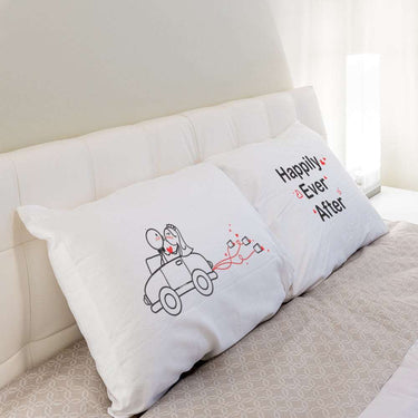 His and hers pillowcases with romantic designs, perfect as a romantic anniversary gift set