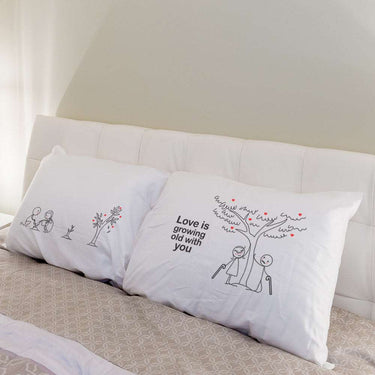 His and hers pillowcases with romantic illustrations for a romantic anniversary gift set
