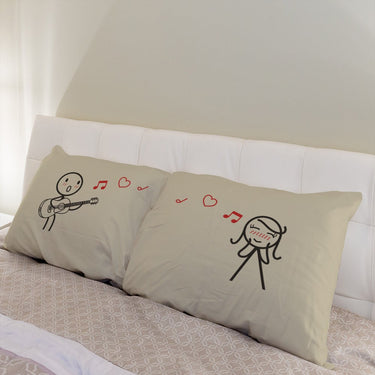 His and hers pillowcases featuring cute couple illustrations, perfect as a romantic gift set for couples