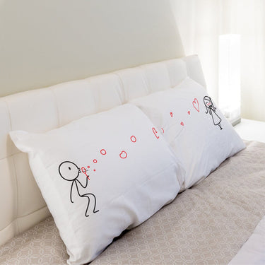 His and hers pillowcases with cute illustrations, perfect as a romantic gift set for couples