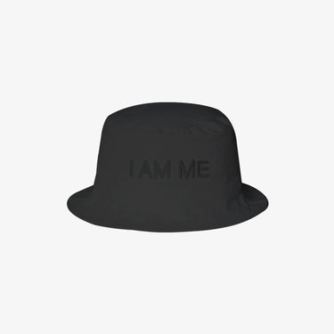 Black bucket hat with 'I AM ME' text, a stylish self-love fashion accessory for confident individuals