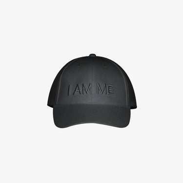 Dark green cap with embroidered text 'I AM ME', a self-love fashion accessory for confident style