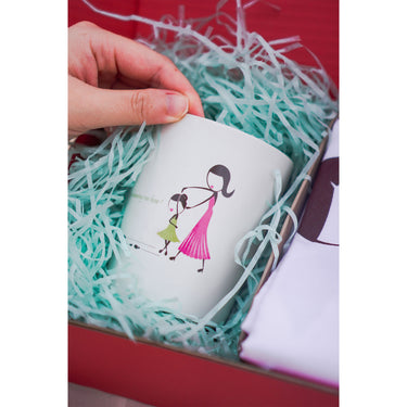 Sentimental Gifts for Mothers, featuring a cute mug with a mother and daughter illustration nestled in gift box filling