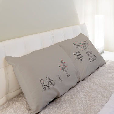 His and hers pillowcases featuring playful love theme, perfect as a wedding gift set for bride