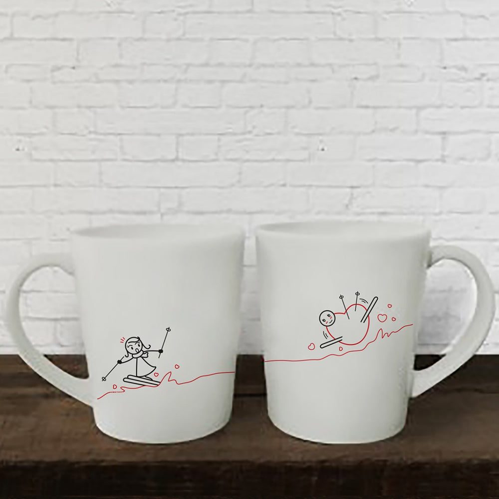 Surprise your loved ones with adorable hand-drawn designs on a pair of charming white mugs, perfect for couples and anniversary celebrations!