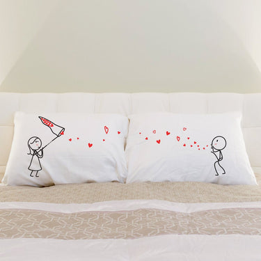 His and hers pillowcases featuring playful romance design, perfect as romantic couple gifts.