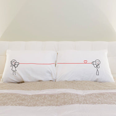 His and hers pillowcases featuring a cute illustration for romantic couple gifts for anniversaries