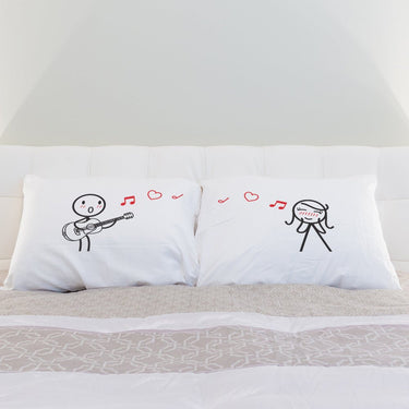His and hers pillowcases featuring a romantic design, perfect for romantic bedroom decor