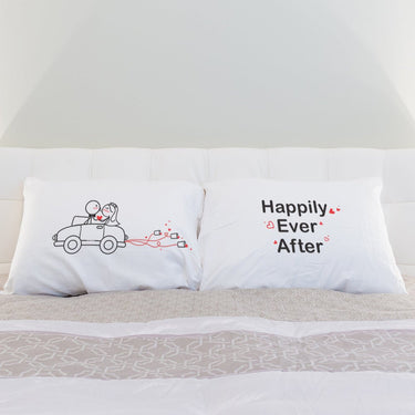 His and hers pillowcases featuring a romantic design and the phrase Happily Ever After, perfect for wedding engagement gift ideas