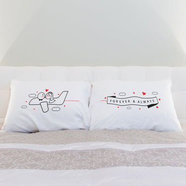 His and hers pillowcases featuring romantic designs, perfect wedding keepsake pillows for couples.