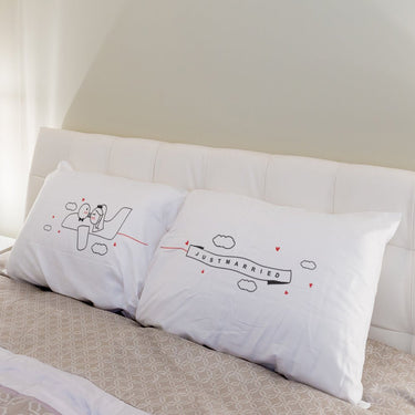 His and hers pillowcases with whimsical design, perfect Love Takes Flight unique wedding gifts for him and her.