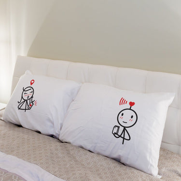 His and hers personalized anniversary pillows featuring cute couple illustrations for a romantic touch