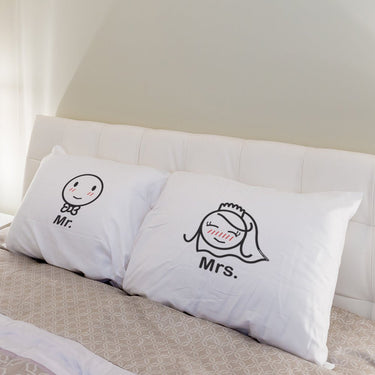 His and hers pillowcases with cute designs, perfect for unique wedding decorations