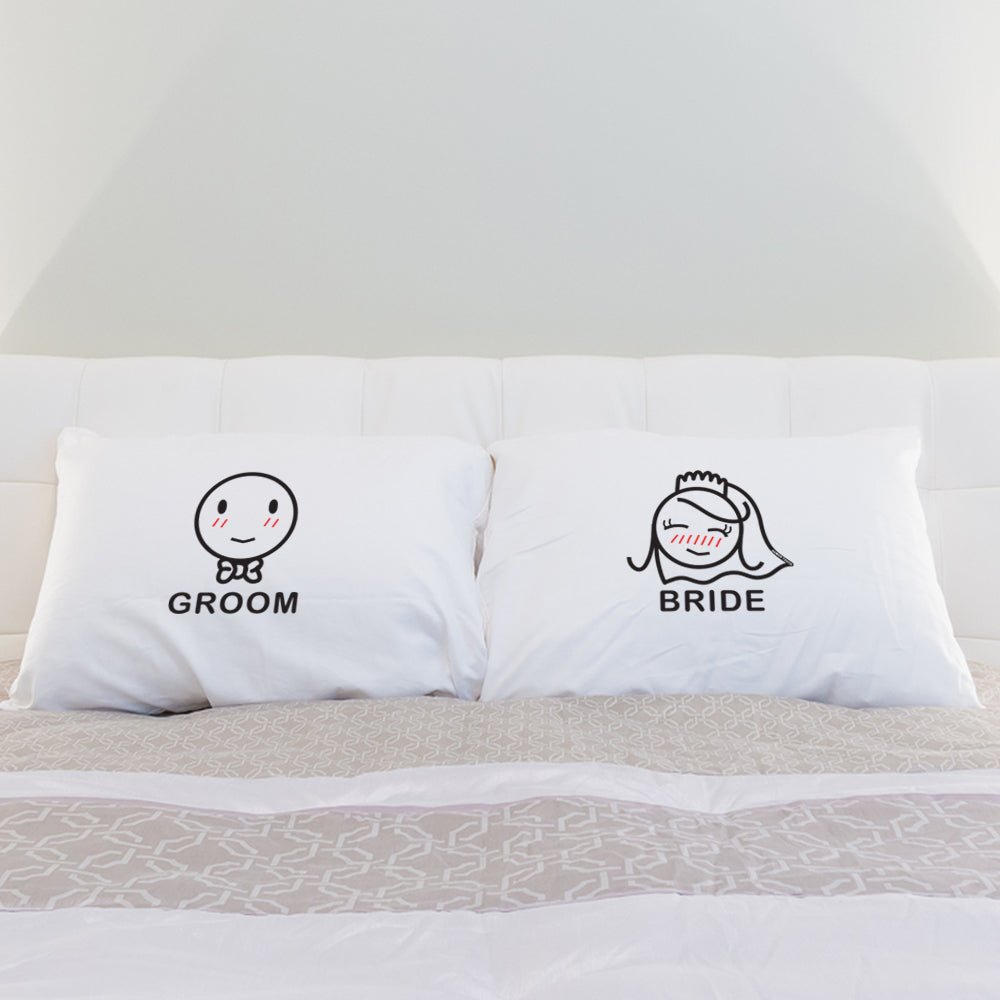 Two adorable pillows rest on a cozy bed, perfect for celebrating love and anniversaries with that special someone.