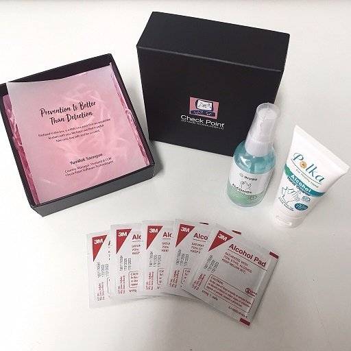 Customized corporate gifts during COVID including a facial mask, alcohol pads, and sanitizing gel