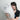 Smiling person hugging a romantic 2-in-1 pillow gift with a cute design